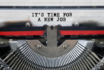 IT’S TIME FOR A NEW JOB Typed Words On a Vintage Typewriter Conceptual