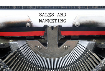 SALES AND MARKETING typed words on a Vintage Typewriter Conceptual