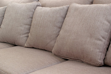 square pillows on sofa in living room