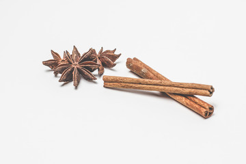 cinnamon stick and star anise spice isolated on white background closeup