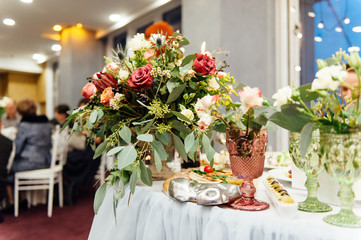 table set with flowers for wedding