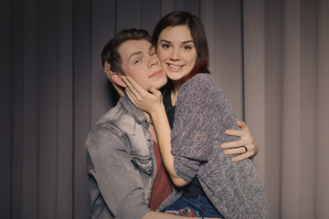 Happy couple in love in a photo booth