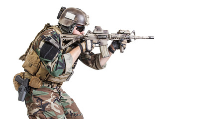 United states Marine Corps special operations command Marsoc raider with weapon aiming a gun....