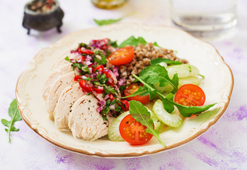 Fototapeta na wymiar Diet food. Chicken breast with buckwheat and vegetables. Healthy lifestyle. Sports nutrition.
