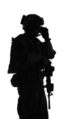 Fototapeta premium United states Marine Corps special operations command Marsoc raider with weapon. Silhouette of of Marine Special Operator white background