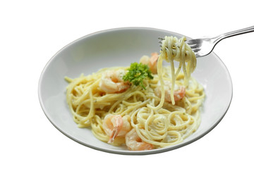Spaghetti Carbonara or white cream sauce pasta with shrimp.