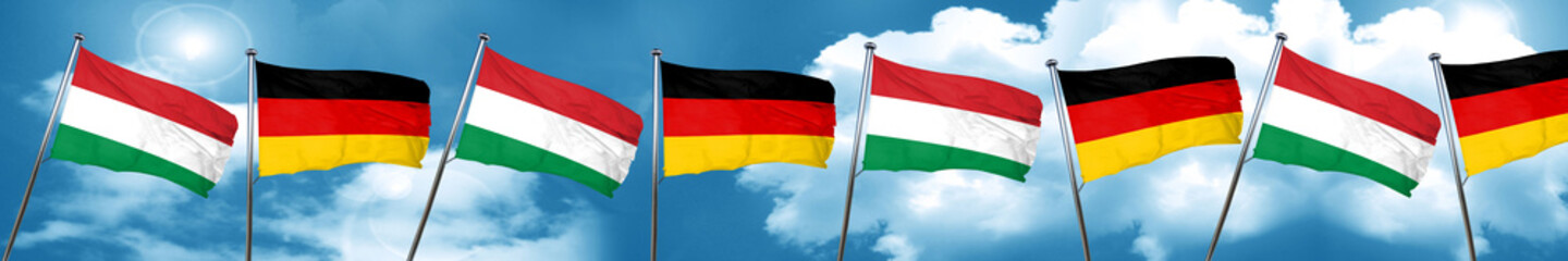 Hungary flag with Germany flag, 3D rendering