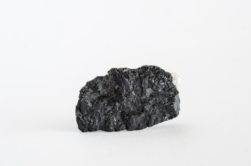 Piece of tourmaline ore on white background