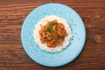Rice with meat in tomato sause