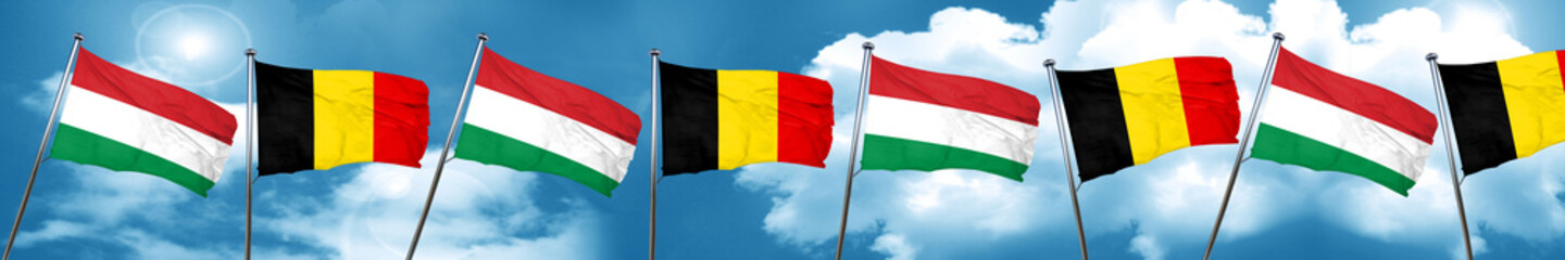 Hungary flag with Belgium flag, 3D rendering