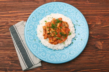 Rice with meat in tomato sause