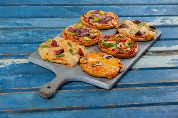 Various delicious italian pizza served on pizza tray