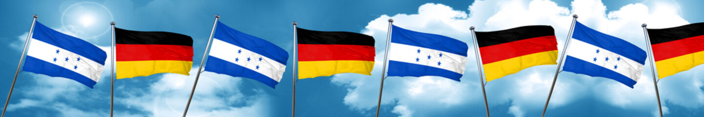 Honduras flag with Germany flag, 3D rendering