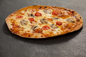 Delicious italian pizza served on grey background