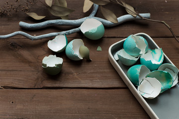 Blue tinted egg shells - minimalist Easter composition
