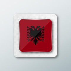 Square button with the national flag of Albania with the reflection of light. Icon with the main symbol of the country.