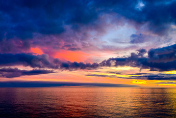 Fototapeta na wymiar Colorful dramatic sunset above Glenelg Beach