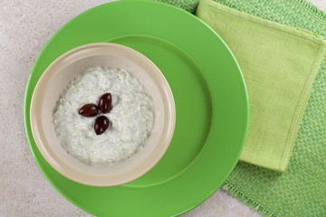 Tzatziki sauce in a bowl, view from the top