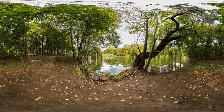 Full 360 degree equirectangula panorama in the park by the lake