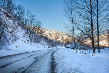 Mountain road in a sunny day, Rikoti pass, Georgia