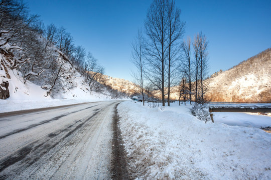Mountain road in a sunny day, Rikoti pass, Georgia