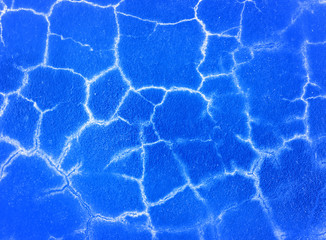 Fototapeta premium Wall fragment with blue scratches