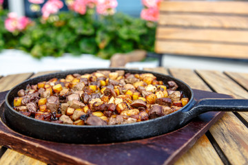 The Azerbaijan cuisine. Fried potatoes with meat and liver