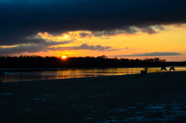 Beautiful winter sunset on river Dnieper