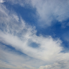 White clouds on a background of blue sky.