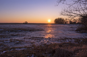 Fototapeta na wymiar Sunset at the winter evening