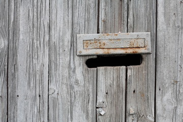 Old mailbox integrated into fence panels