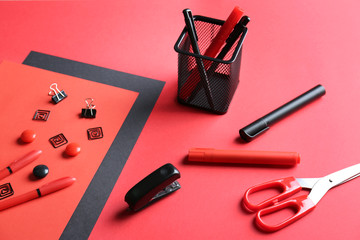 Red and black stationery on red background