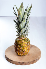 Fresh juicy pineapple on the table