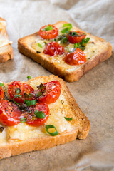 Grilled toast with camembert and cherry tomatoes