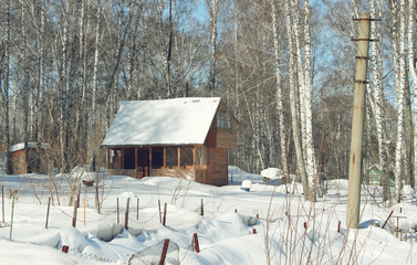 Snowbound country house in the early morning