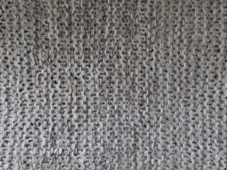 Background from knitted fabric grey