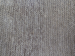 Background texture of knitted canvas gray wool
