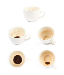 Cup with coffee leftovers isolated