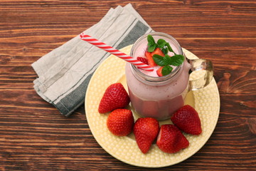 Smoothie with strawberries and milk. Healthy eating concept.