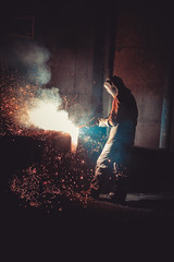 Fototapeta premium Welder weld metal structure