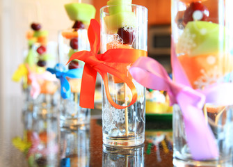 Decoration of fruit glasses in a row