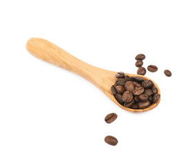 Wooden spoon full of coffee isolated