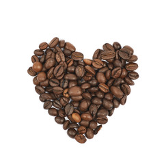 Heart shaped pile of coffee beans isolated