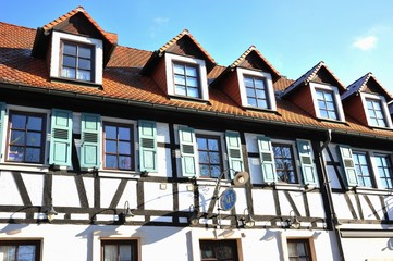 Renovated House-Front with Dormer Windows (Gauben) at tiled Roof (Ziegeldach)