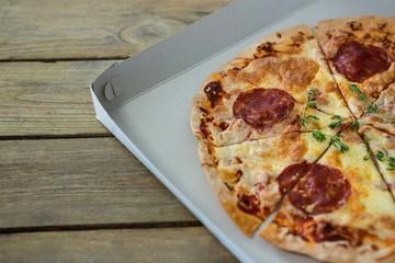 Close-up of Italian pizza in a opened box