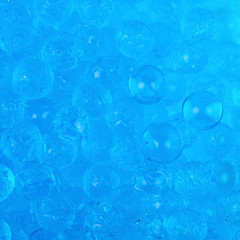 Surface coated with soil water beads