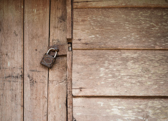 Old wooden door with Chain key lock