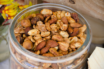 Jar of roasted nuts at function