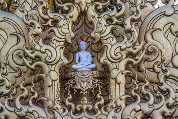 Wat Rong Khun better known as the White Buddhist Temple in Chiang Rai Province, Thailand. 