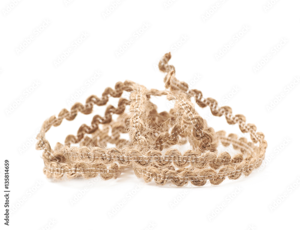Wall mural pile of a linen rope string isolated